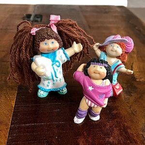 Set of Three Vintage Cabbage Patch Doll Resin Figurines